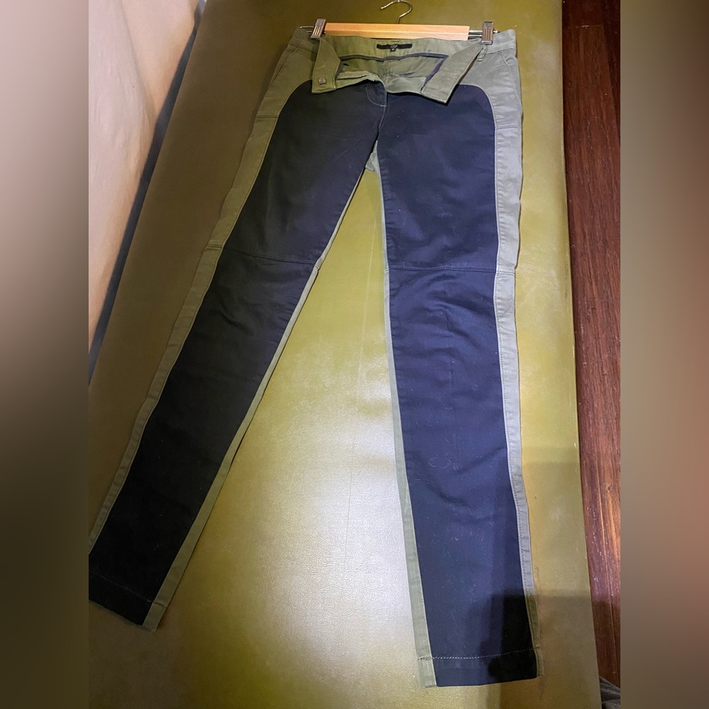 Price $25. Selling Tibi olive and black skinny pant.